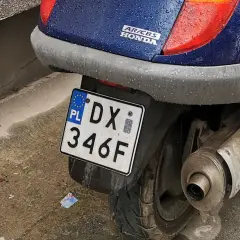 Skuter Honda Pantheon z tablicą rejestracyjną DX 346F.