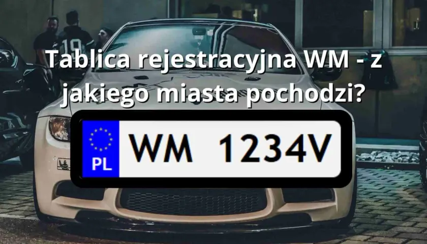 Tablica rejestracyjna WM - z jakiego miasta pochodzi? Widoczny numer rejestracyjny WM 1234V na białej tablicy z symbolem PL.
