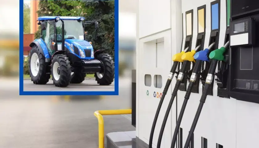 Niebieski traktor czeka na tankowanie. Czy akcyza na paliwo wpłynie na jego pracę?